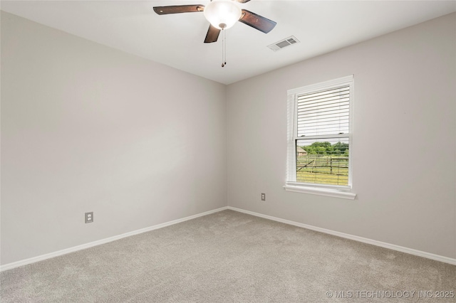 9005 N 154th E Ct, Owasso, OK 74055 - spare room featuring light carpet and a ceiling fan