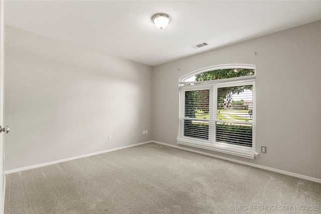 9005 N 154th E Ct, Owasso, OK 74055 - spare room with baseboards and carpet floors