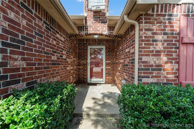 9005 N 154th E Ct, Owasso, OK 74055 - view of exterior entry featuring brick siding