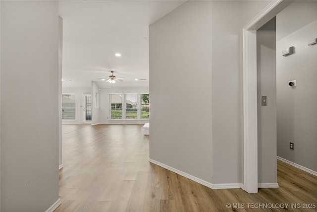 9005 N 154th E Ct, Owasso, OK 74055 - hall featuring light wood finished floors and recessed lighting