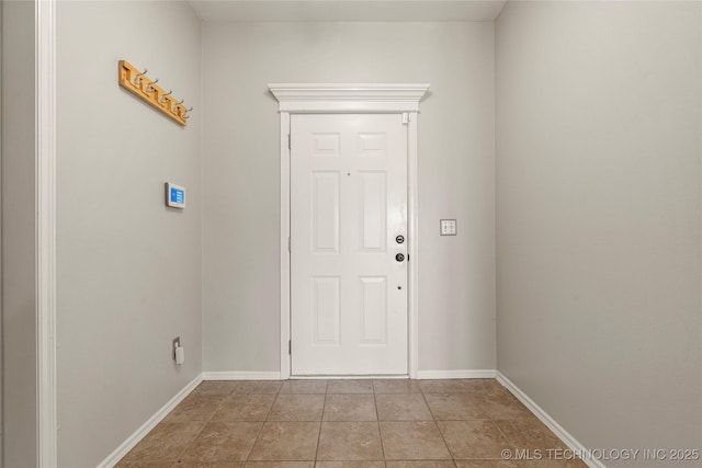 9005 N 154th E Ct, Owasso, OK 74055 - foyer entrance with baseboards and light tile patterned floors