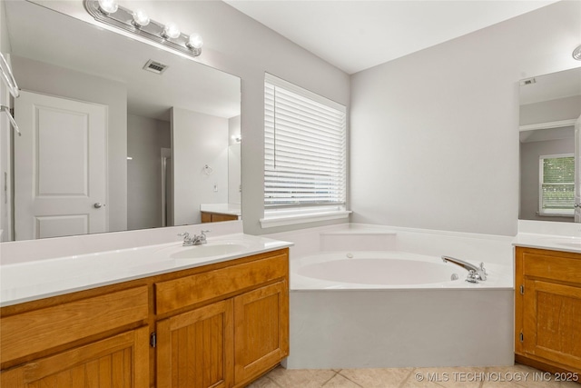 9005 N 154th E Ct, Owasso, OK 74055 - full bathroom with vanity, a garden tub, and tile patterned flooring