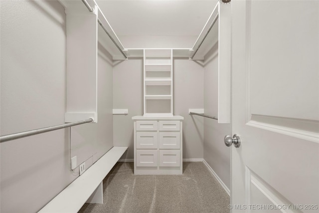 9005 N 154th E Ct, Owasso, OK 74055 - walk in closet featuring light colored carpet