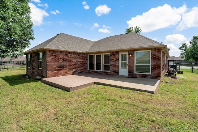 9005 N 154th E Ct, Owasso, OK 74055 - rear view of property with brick siding, a shingled roof, and a patio area