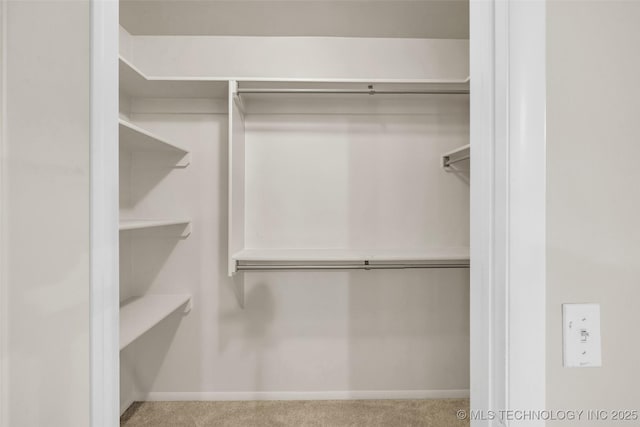 4350 E 74th Pl, Tulsa, OK 74136 - spacious closet featuring carpet flooring