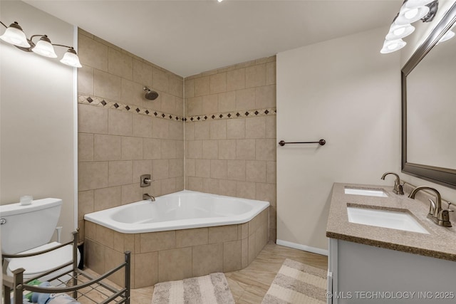 4350 E 74th Pl, Tulsa, OK 74136 - bathroom featuring tiled shower / bath and double vanity