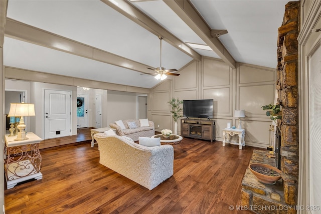 4350 E 74th Pl, Tulsa, OK 74136 - living room featuring a decorative wall, wood finished floors, and a ceiling fan