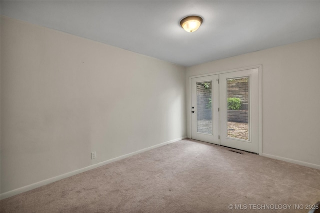 4350 E 74th Pl, Tulsa, OK 74136 - carpeted empty room with baseboards