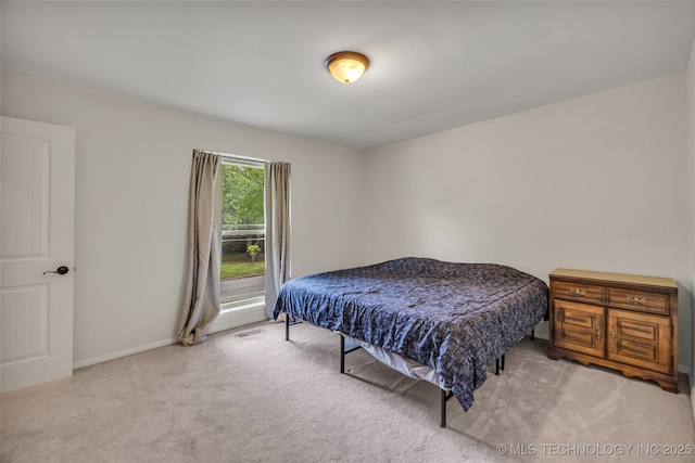 4350 E 74th Pl, Tulsa, OK 74136 - bedroom featuring carpet flooring and baseboards