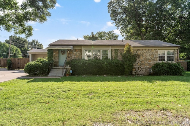 1640 E 41st St, Tulsa, OK 74105 - ranch-style house with stone siding, a chimney, and driveway
