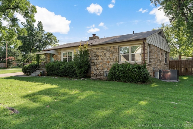 1640 E 41st St, Tulsa, OK 74105 - view of front of property featuring stone siding and a chimney