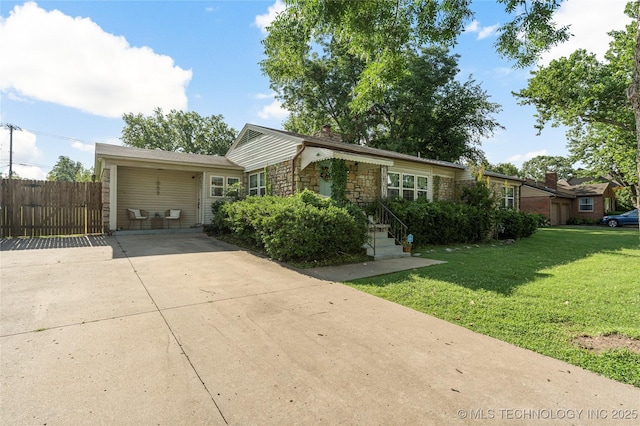 1640 E 41st St, Tulsa, OK 74105 - single story home featuring driveway and stone siding