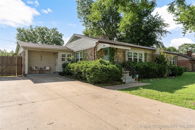 1640 E 41st St, Tulsa, OK 74105 - single story home with stone siding and concrete driveway