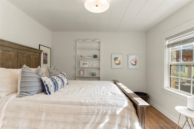 1640 E 41st St, Tulsa, OK 74105 - bedroom with wood finished floors and baseboards