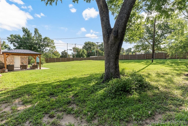 1640 E 41st St, Tulsa, OK 74105 - fenced backyard featuring a gazebo and an outdoor living space