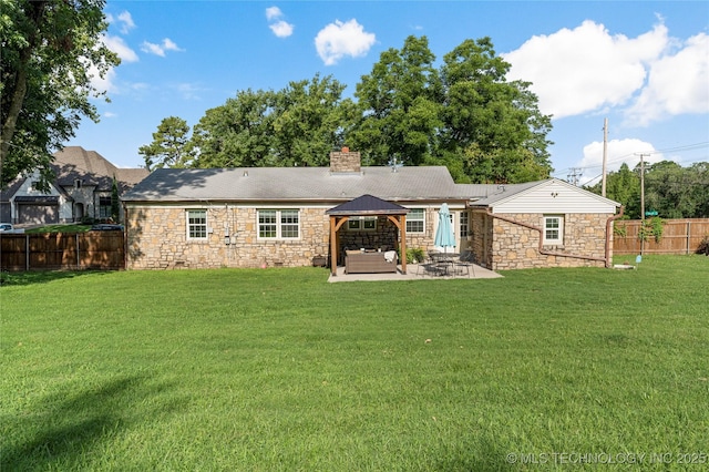 1640 E 41st St, Tulsa, OK 74105 - view of front of property with stone siding, a patio, a chimney, and a fenced backyard