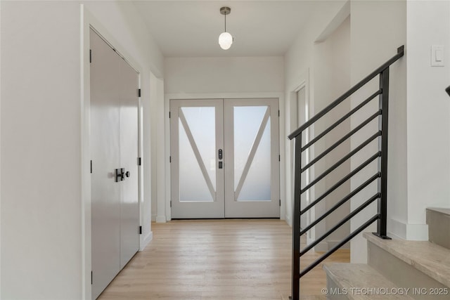 1732 S Jamestown Ave, Tulsa, OK 74112 - foyer entrance featuring stairway, light wood-style floors, and french doors