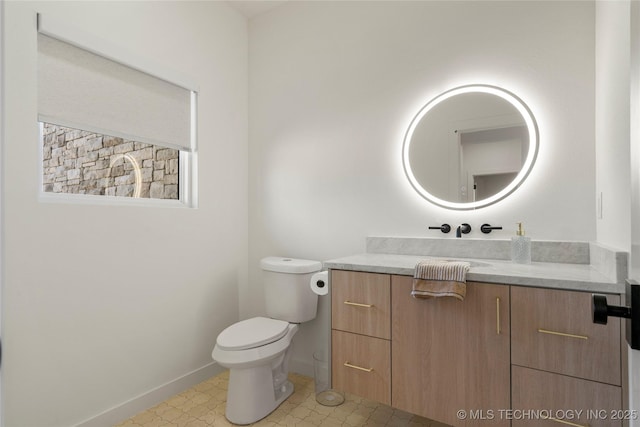 1732 S Jamestown Ave, Tulsa, OK 74112 - bathroom with baseboards and vanity