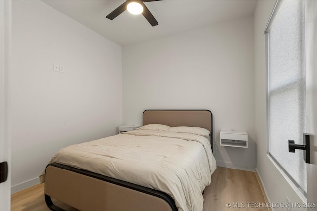 1732 S Jamestown Ave, Tulsa, OK 74112 - bedroom with light wood-style floors and a ceiling fan