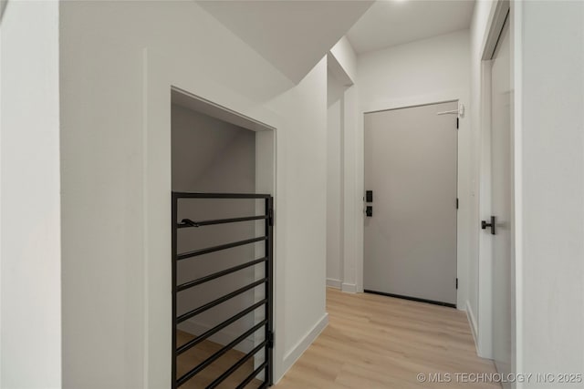 1732 S Jamestown Ave, Tulsa, OK 74112 - hall with light wood finished floors and an upstairs landing