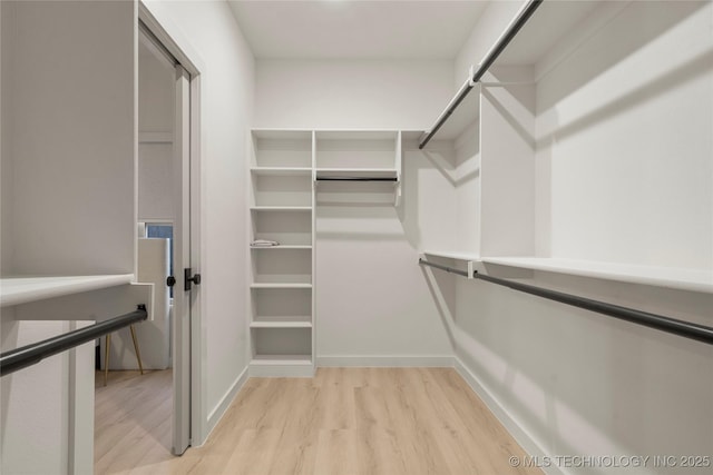 1732 S Jamestown Ave, Tulsa, OK 74112 - spacious closet with light wood-style floors