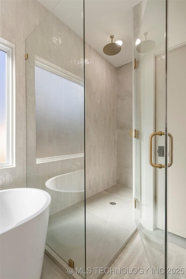 1732 S Jamestown Ave, Tulsa, OK 74112 - full bath featuring a stall shower and a freestanding tub