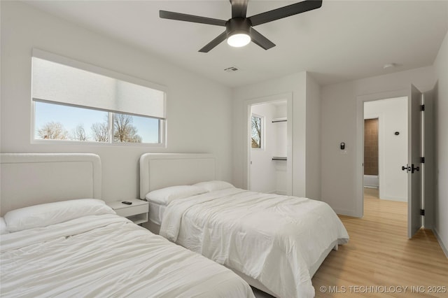 1732 S Jamestown Ave, Tulsa, OK 74112 - bedroom with light wood-type flooring and ceiling fan