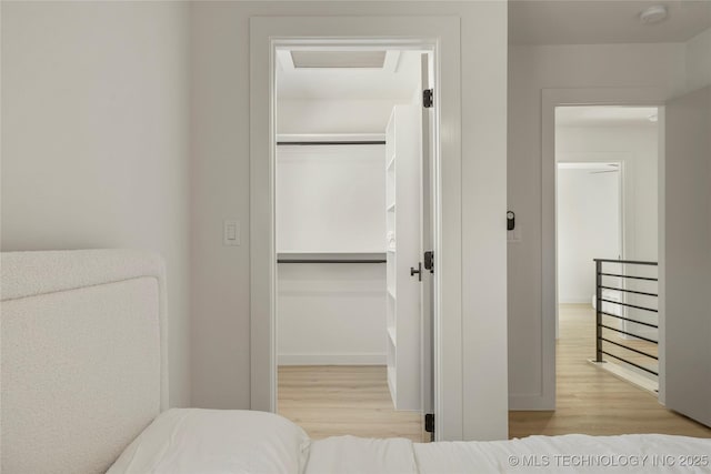 1732 S Jamestown Ave, Tulsa, OK 74112 - bedroom with light wood-style floors and a closet