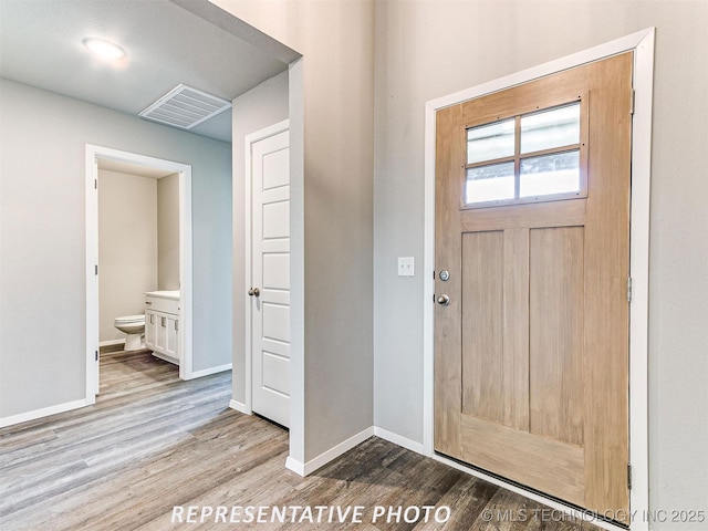9533 E 131st Pl S, Bixby, OK 74008 - entrance foyer with wood finished floors and baseboards