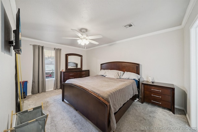 6376 S 80th E Ave Unit G, Tulsa, OK 74133 - bedroom with light colored carpet, crown molding, and ceiling fan