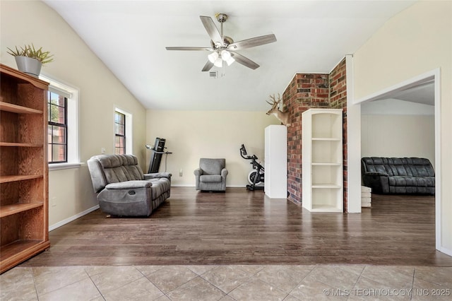 1508 Melissa Cir, Sapulpa, OK 74066 - living area featuring lofted ceiling, ceiling fan, and wood finished floors