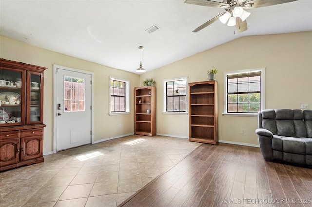 1508 Melissa Cir, Sapulpa, OK 74066 - sitting room featuring lofted ceiling, a ceiling fan, and wood finished floors