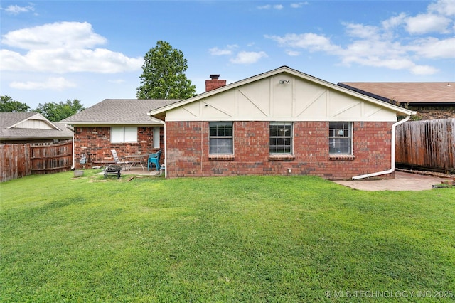 1508 Melissa Cir, Sapulpa, OK 74066 - rear view of house featuring a patio, a chimney, a fenced backyard, and brick siding