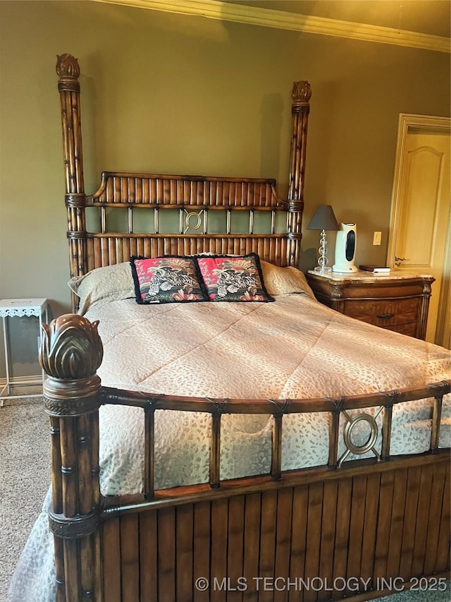 910 Summit Rdg, Mcalester, OK 74501 - carpeted bedroom with ornamental molding