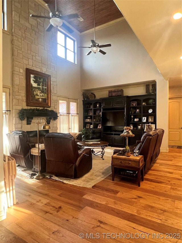 910 Summit Rdg, Mcalester, OK 74501 - living area with a ceiling fan, high vaulted ceiling, wood finished floors, and ornamental molding