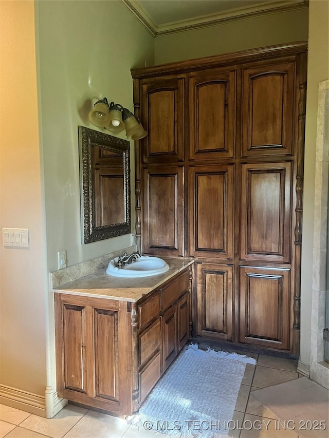 910 Summit Rdg, Mcalester, OK 74501 - bathroom featuring tile patterned flooring, vanity, and ornamental molding