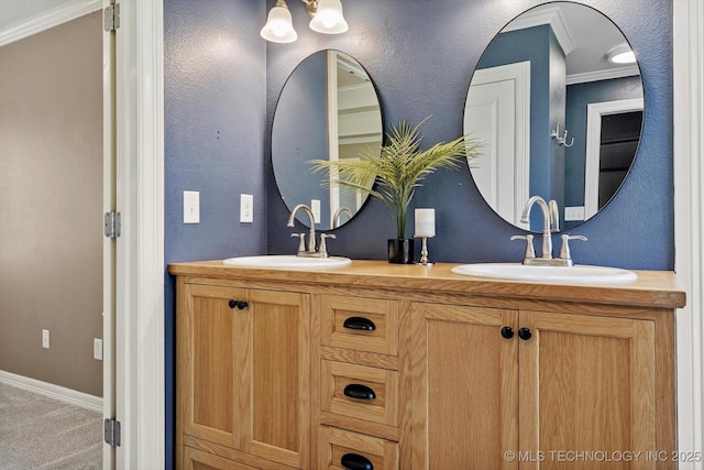 7185 N 194th E Ave, Owasso, OK 74055 - full bathroom with double vanity, ornamental molding, and a textured wall