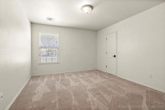 7185 N 194th E Ave, Owasso, OK 74055 - unfurnished room with carpet and baseboards