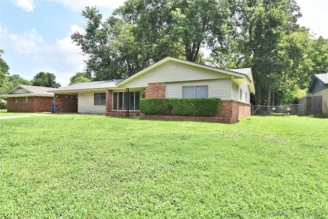 5701 S Rockford Pl, Tulsa, OK 74105 - ranch-style home featuring brick siding