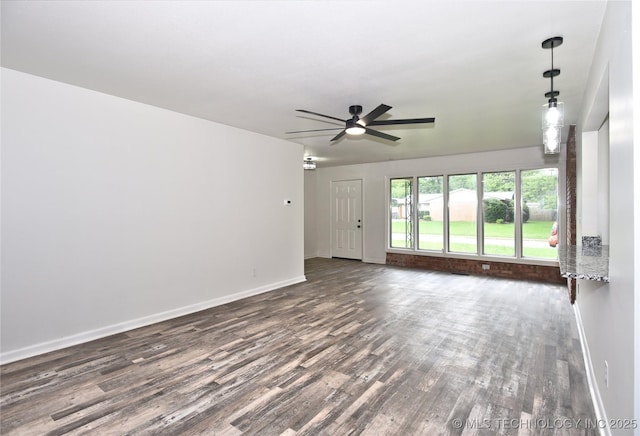 5701 S Rockford Pl, Tulsa, OK 74105 - spare room with dark wood-type flooring and ceiling fan