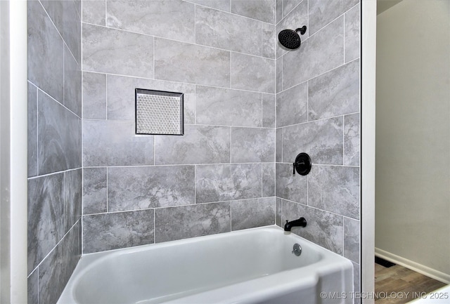5701 S Rockford Pl, Tulsa, OK 74105 - bathroom featuring wood finished floors and bathtub / shower combination