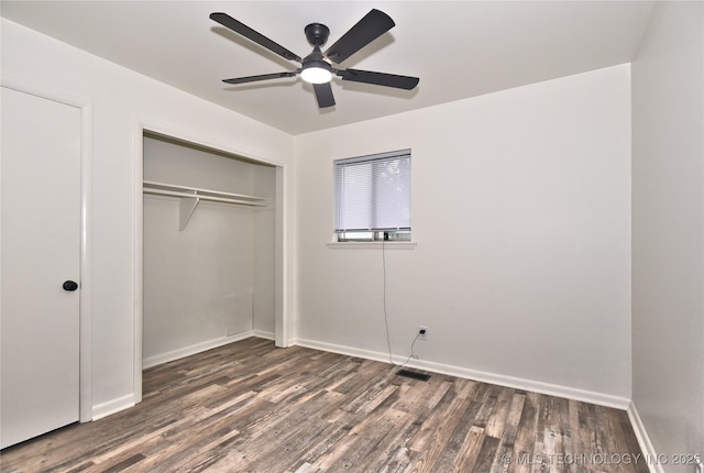 5701 S Rockford Pl, Tulsa, OK 74105 - unfurnished bedroom featuring dark wood finished floors, a closet, and ceiling fan