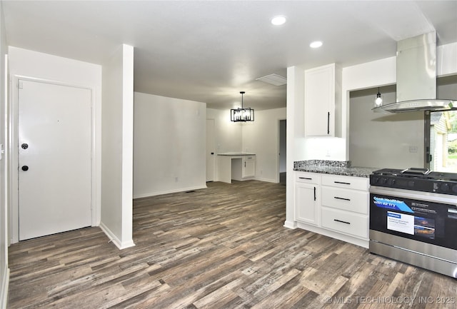 5701 S Rockford Pl, Tulsa, OK 74105 - kitchen with stainless steel gas stove, island exhaust hood, dark wood-type flooring, white cabinetry, and recessed lighting
