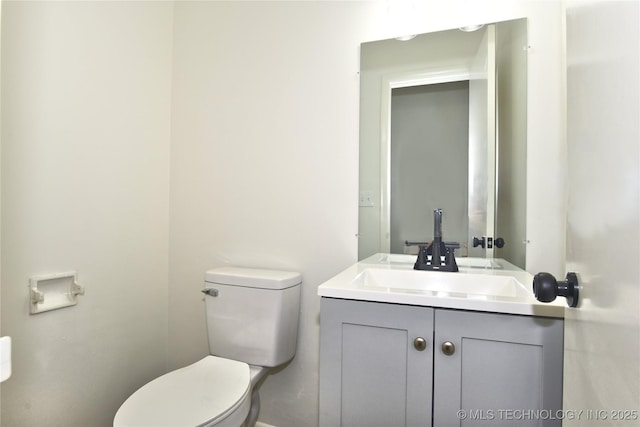 5701 S Rockford Pl, Tulsa, OK 74105 - half bathroom featuring toilet and vanity