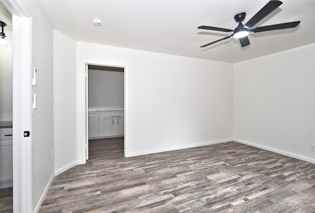 5701 S Rockford Pl, Tulsa, OK 74105 - spare room featuring wood finished floors and ceiling fan