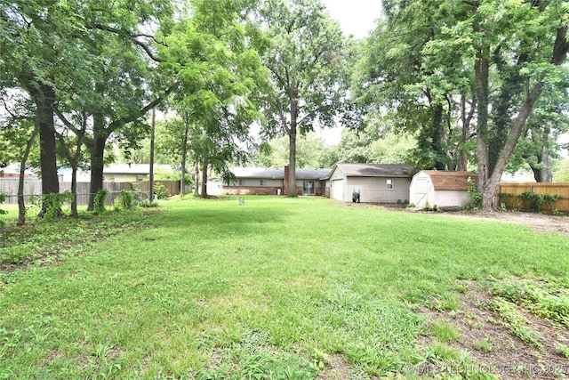 5701 S Rockford Pl, Tulsa, OK 74105 - view of yard featuring a shed