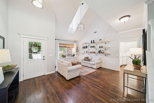 14003 E 87th Pl N, Owasso, OK 74055 - living area featuring high vaulted ceiling, dark wood-type flooring, and wainscoting