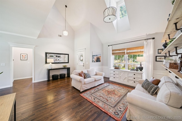 14003 E 87th Pl N, Owasso, OK 74055 - living area featuring high vaulted ceiling, wood finished floors, a skylight, and a wainscoted wall