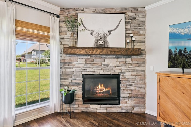 14003 E 87th Pl N, Owasso, OK 74055 - detailed view of ornamental molding, a fireplace, and wood finished floors