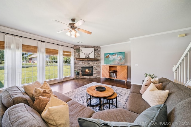 14003 E 87th Pl N, Owasso, OK 74055 - living room with ornamental molding, ceiling fan, wood finished floors, stairs, and a fireplace